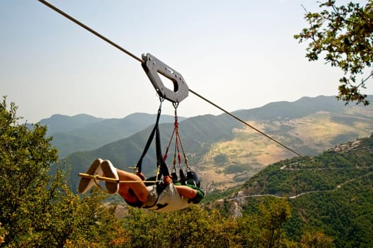 Man who makes the flight of the angel in the Lucan Dolomites