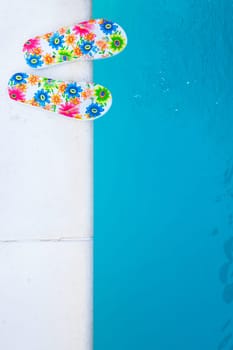 flip-flops near the swimming-pool