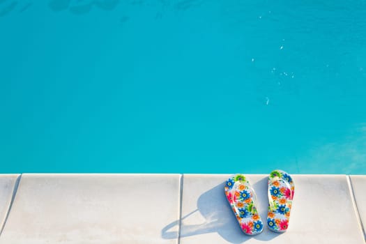 flip-flops near the swimming-pool