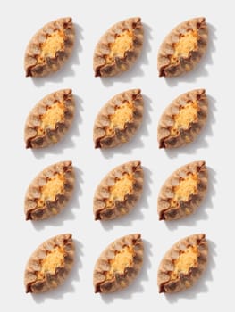 Karelian pies pattern on white background vertical