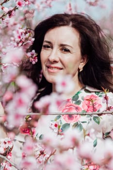 trees nature parks walk portert beautiful woman in pink flowers peach garden