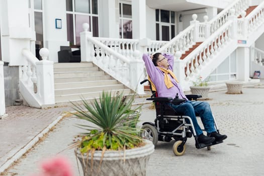 special person with disabilities at the stairs of an office building