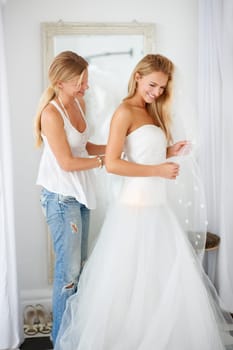 Wedding, fitting and bride with girl friend in a luxury boutique, shop or store mall. Retail, fashion and female person from Canada preparing for marriage ceremony, shopping or reception for love