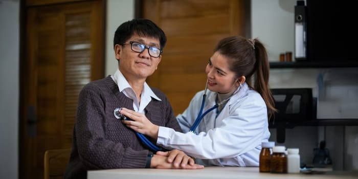 doctor discussion results or symptoms and gives a recommendation to a senior male patient, giving consultation during medical examination in clinic.