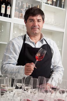 Winemaker tasting wine