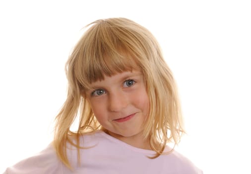 Little blond girl laughs