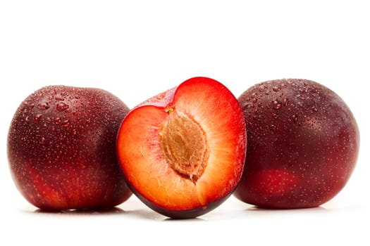 two wet plums and a half