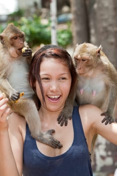 Teenager with monkey