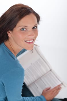 Smiling happy woman with book