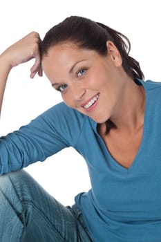 Happy young woman looking at camera