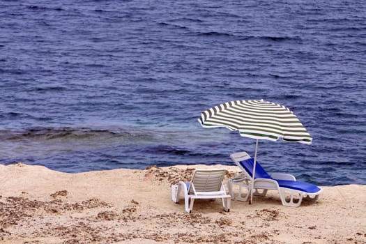 two lonely sun loungers