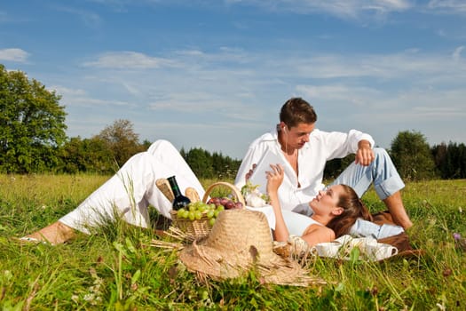 Picnic - Romantic couple in spring nature