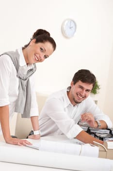 Young man and woman working together
