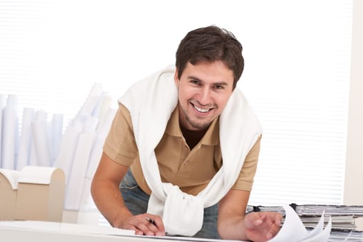 Successful architect man working at office