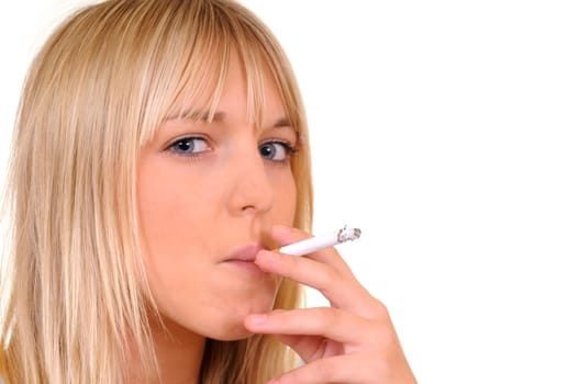 Young woman smoking a cigarette
