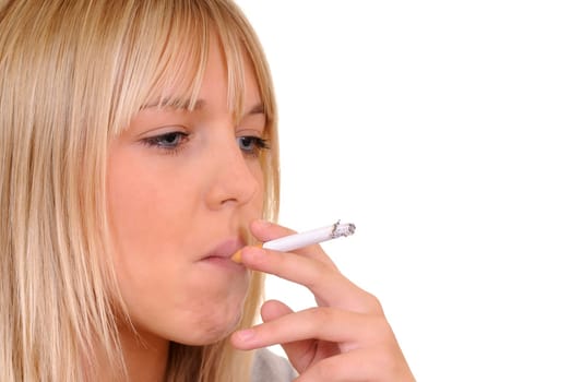 Young woman smoking a cigarette