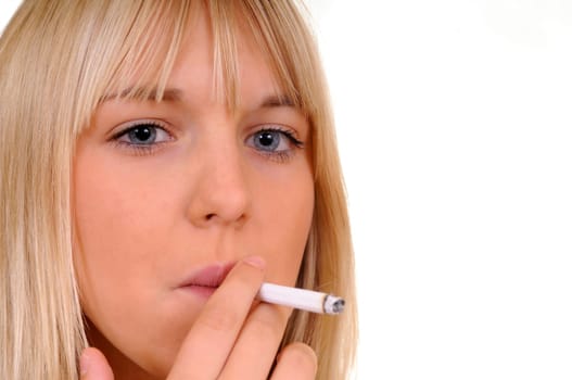 Young woman smoking a cigarette