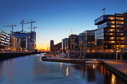 Hamburg Hafencity with construction site Elbphilharmonie in the evening