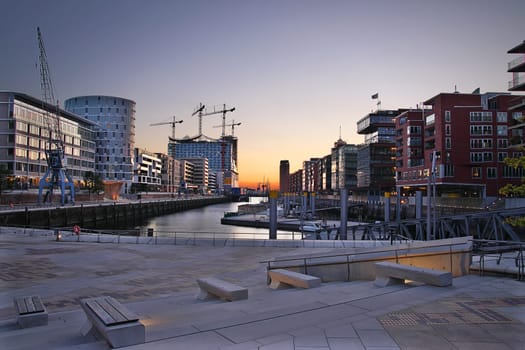 Hamburg Hafencity with construction site Elbphilharmonie in the evening