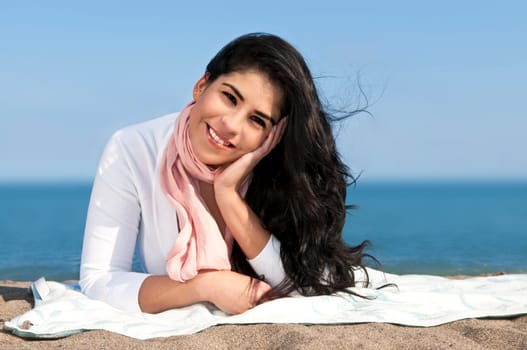 Young native american woman at beach