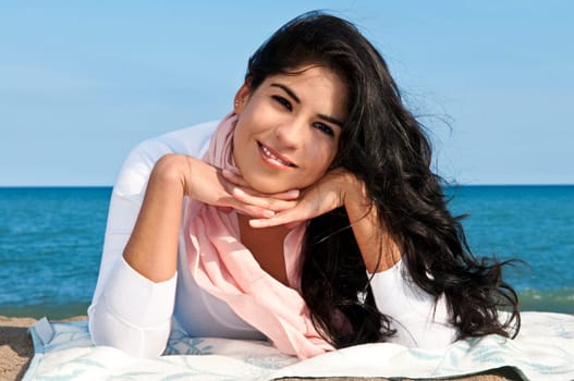 Young native american woman at beach