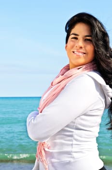Beautiful young woman at beach
