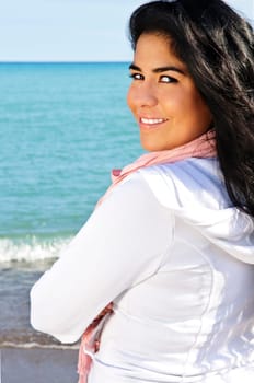 Beautiful young woman at beach