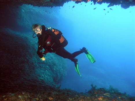 Diver at the cave entrance