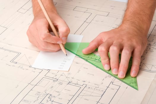 Architect with blueprint