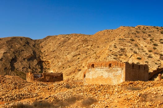 abandoned settlement in the barren mountains of Oman