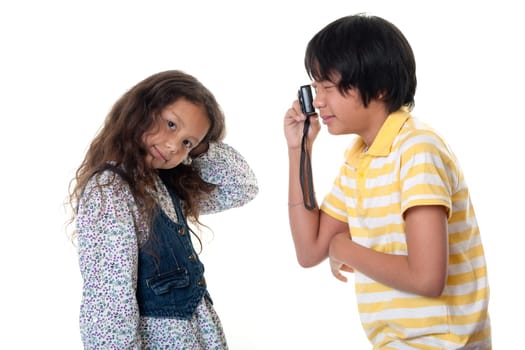 Children take pictures digitally