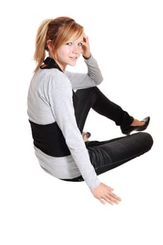 Girl sitting on floor.