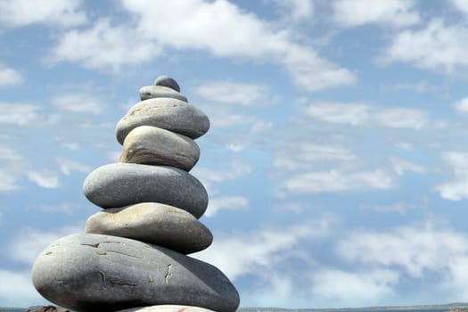 balanced cloudy rocks