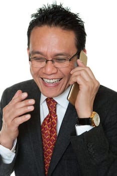 Manager laughing while talking on the phone