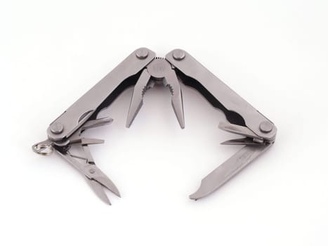Multipurpose hand tool on a plain white background.