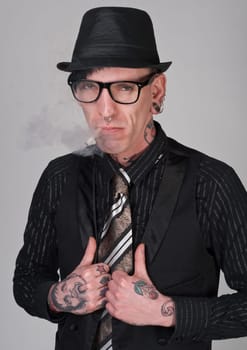 Tattooed man with cigarette