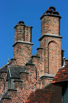 Traditional brick chimneys in Brugge