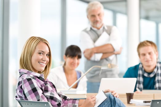 High school - three students with mature professor