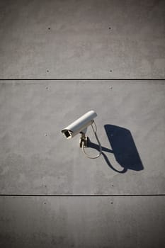 Security camera attached on building