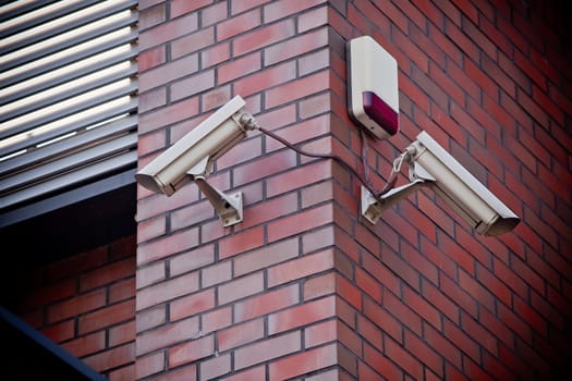 Security camera attached on building