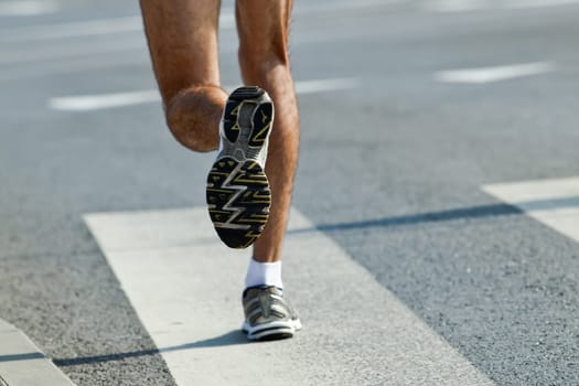 People running in city marathon