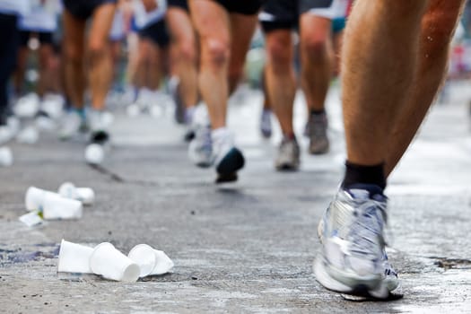 People running in city marathon