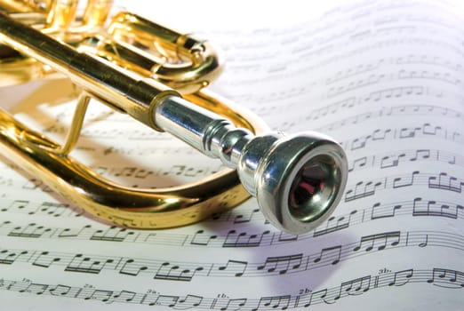trumpet lying on notes