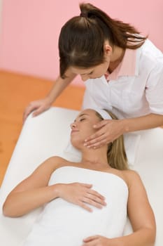 Body care - woman luxury facial massage