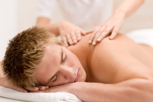 Day spa - man receiving massage