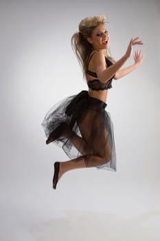 Beautiful girl in diaphanous skirt