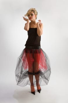 Beautiful girl in diaphanous skirt