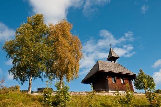 Chapel and trees in autumn
