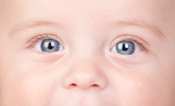 Beautiful baby with blue eyes