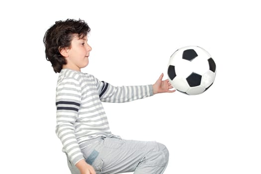 Adorable child playing with a soccer bal